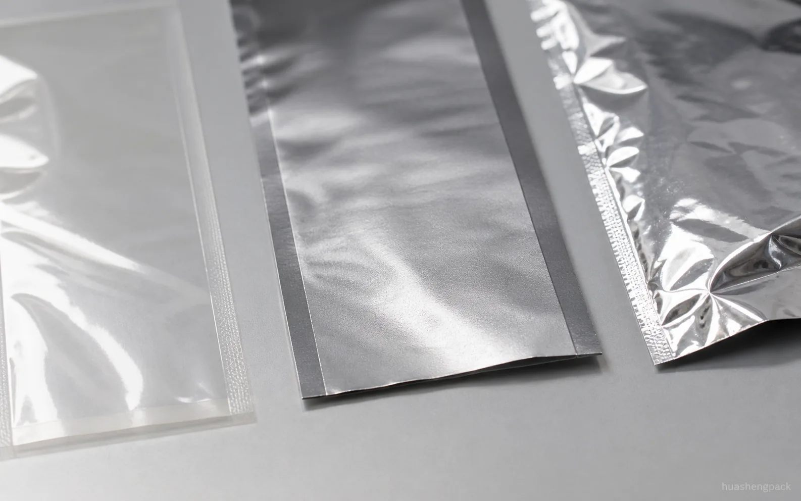 PET/PE vs PET/VMPET/PE vs PET/AL/PE: How to Choose Food Packaging Material Structure - Quick Comparison Table PET/PE vs PET/VMPET/PE vs PET/AL/PE: How to Choose Food Packaging Material Structure - Quick Comparison Table
