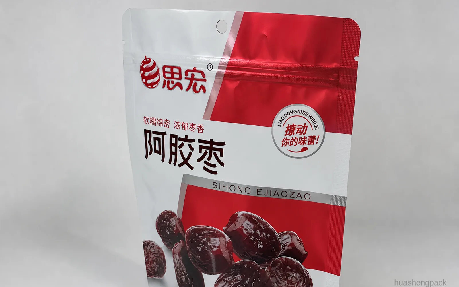 Real custom printed stand up pouch showing zipper, tear notches, hang hole and side seal